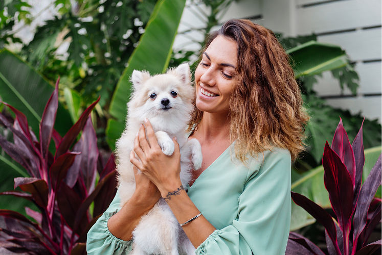 Person enjoying plans knowing their pet is cared for